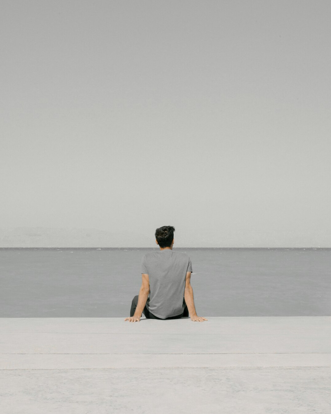 person reflecting alone