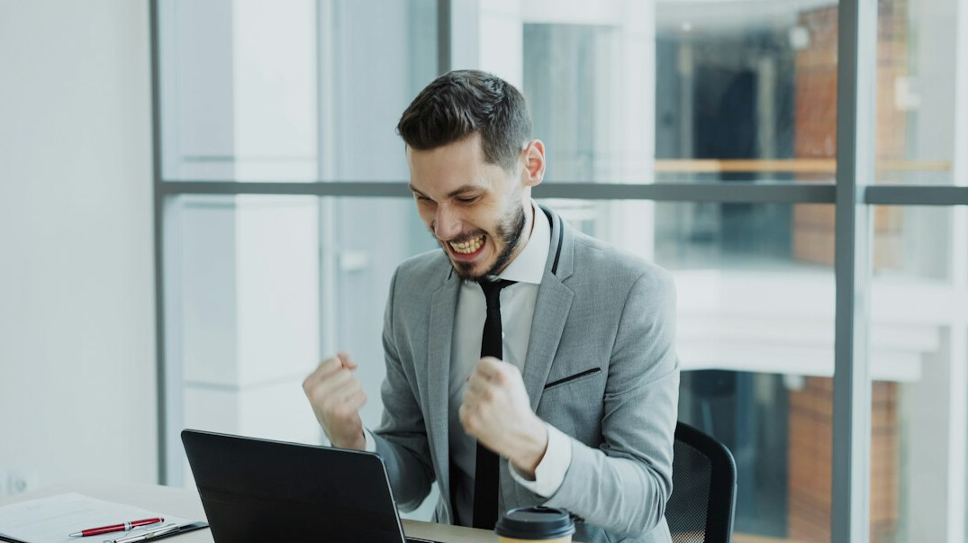 man achieving professional milestone